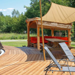A wooden terrace, a pergola and a summer lounge to better enjoy the beautiful days at Le Domaine du Centaure